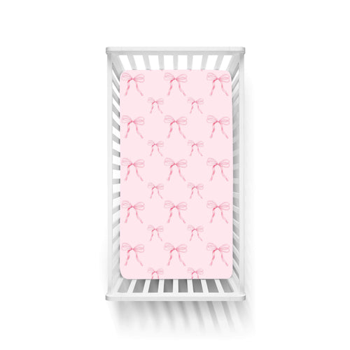 Pink bow crib sheets