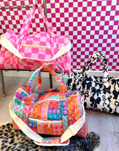 In stock quilted duffle bags